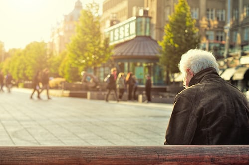 old man sitting on bench