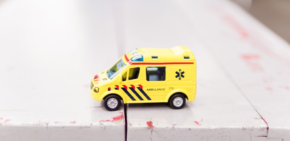 yellow toy ambulance