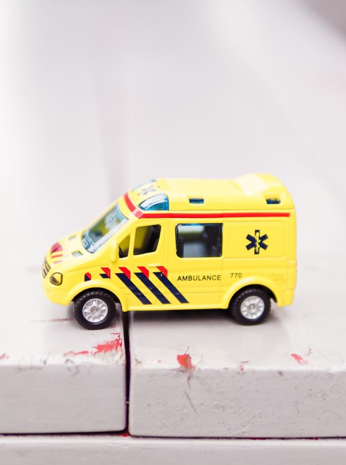 yellow toy ambulance