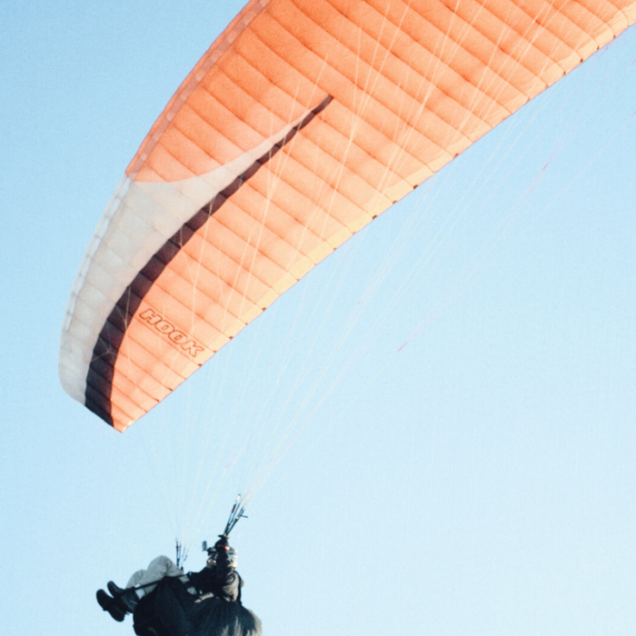 person parachuting in the air