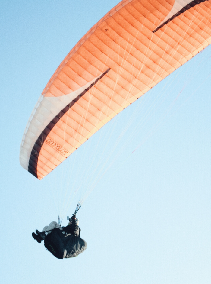 person parachuting in the air