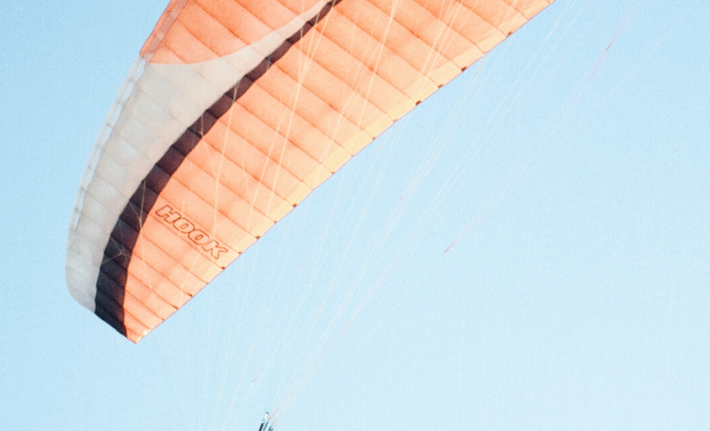 person parachuting in the air