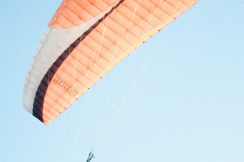 person parachuting in the air