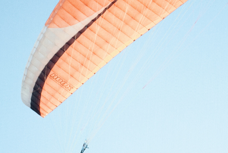 person parachuting in the air
