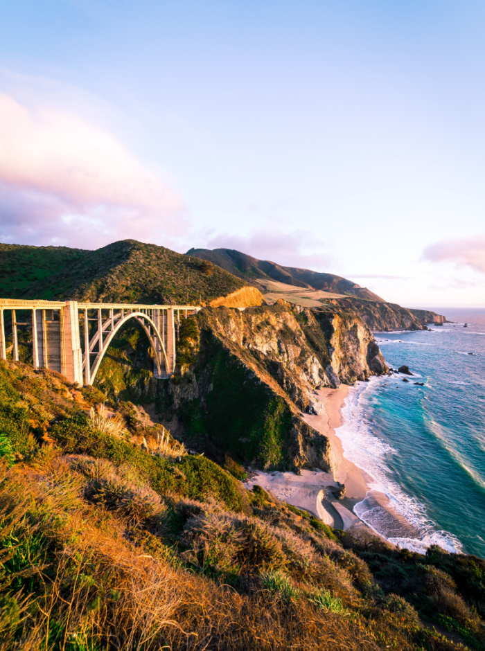bridge overlooking cliff and ocean