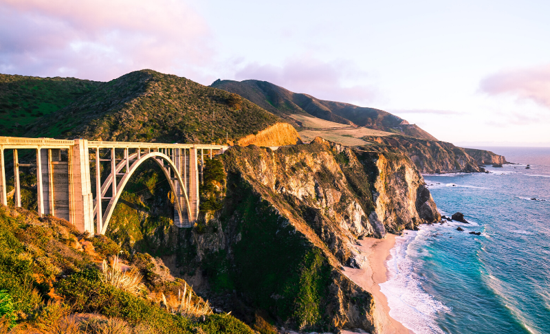 bridge overlooking cliff and ocean