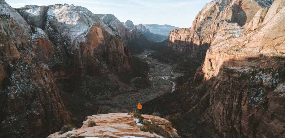 person standing near mountains