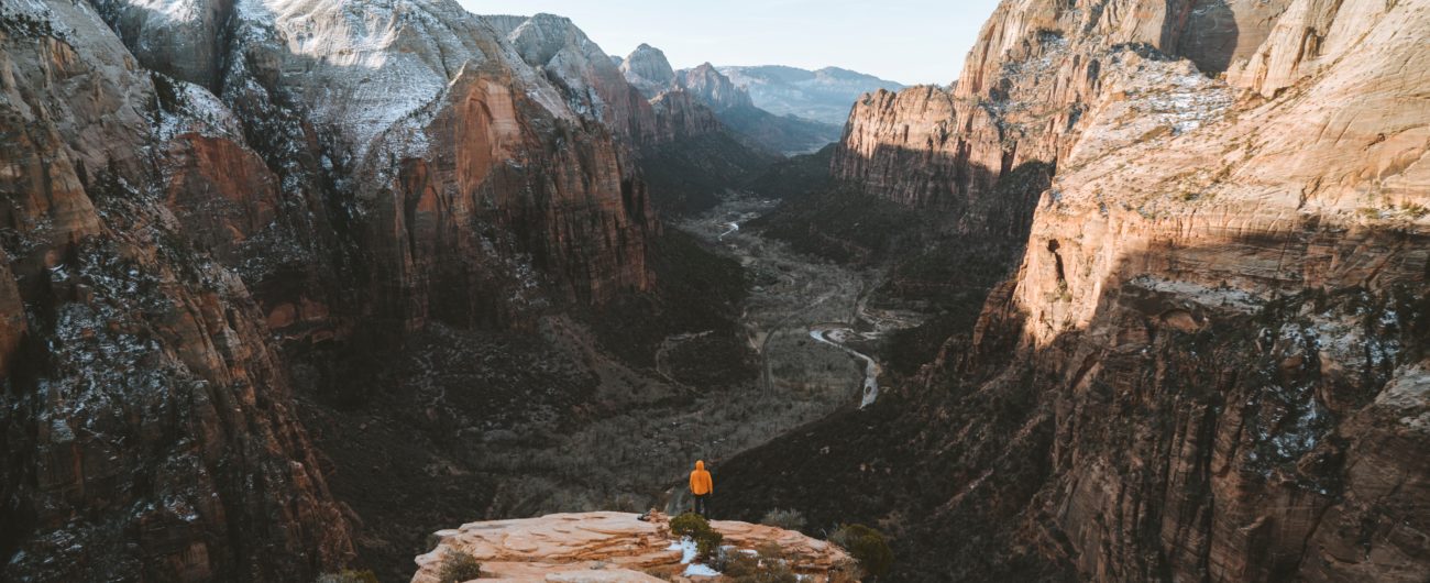 person standing near mountains